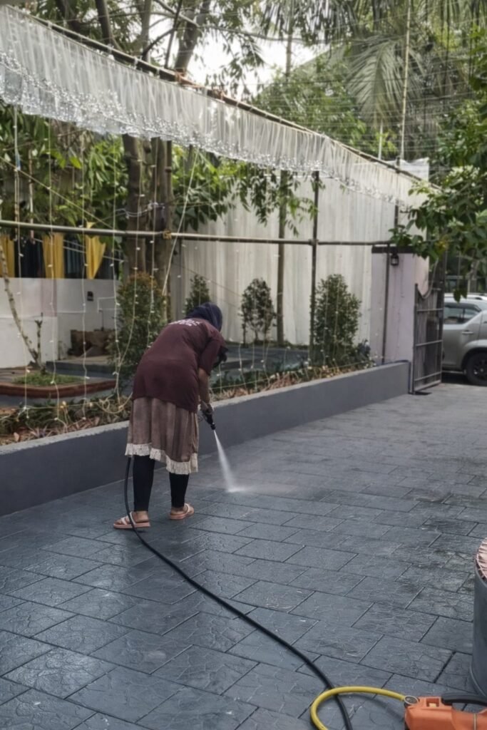 Interlock tile cleaning using high pressure washing in Koyilandy